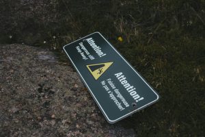 dangerous cliff ahead sign